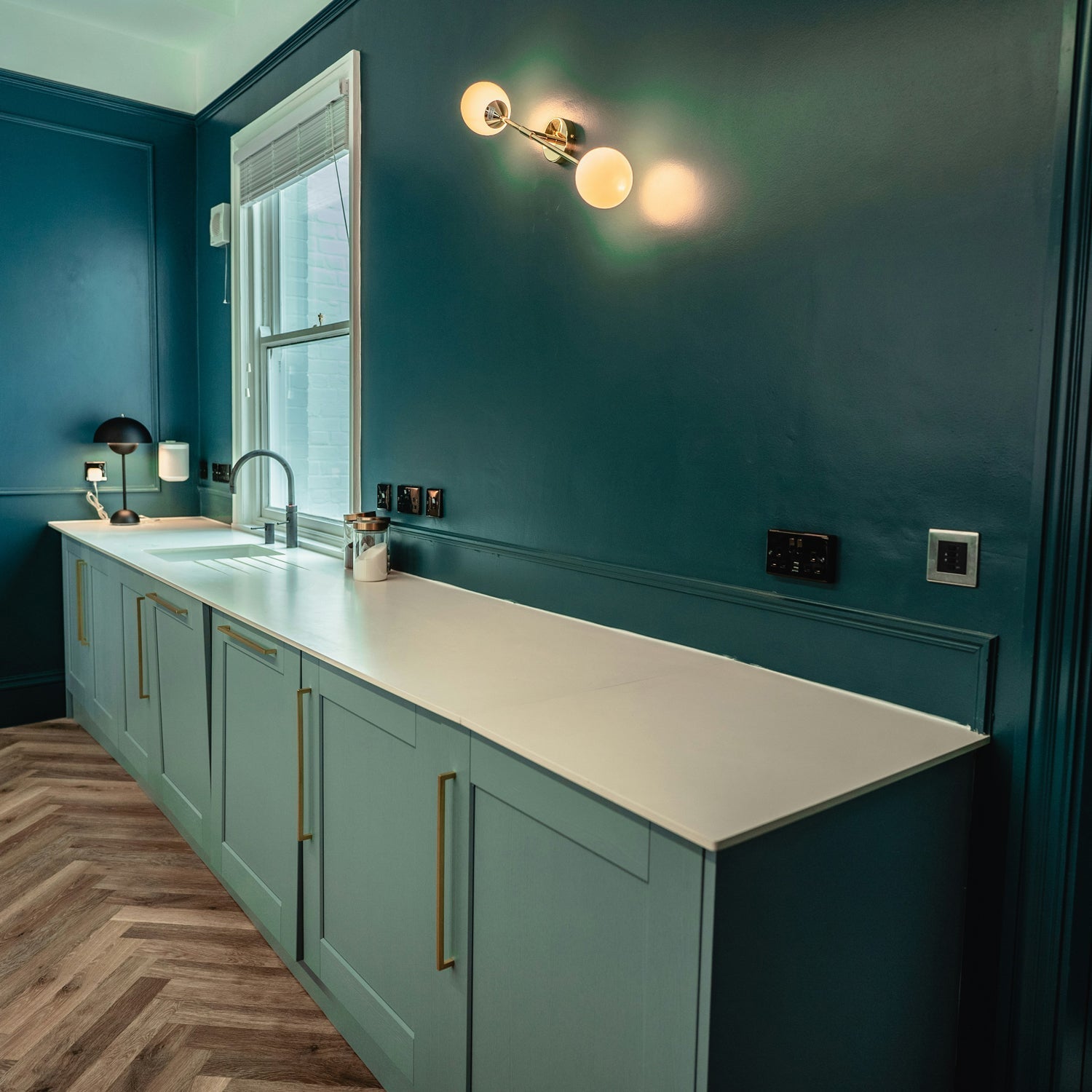 Kitchen lighting layers: ambient, task, and accent.