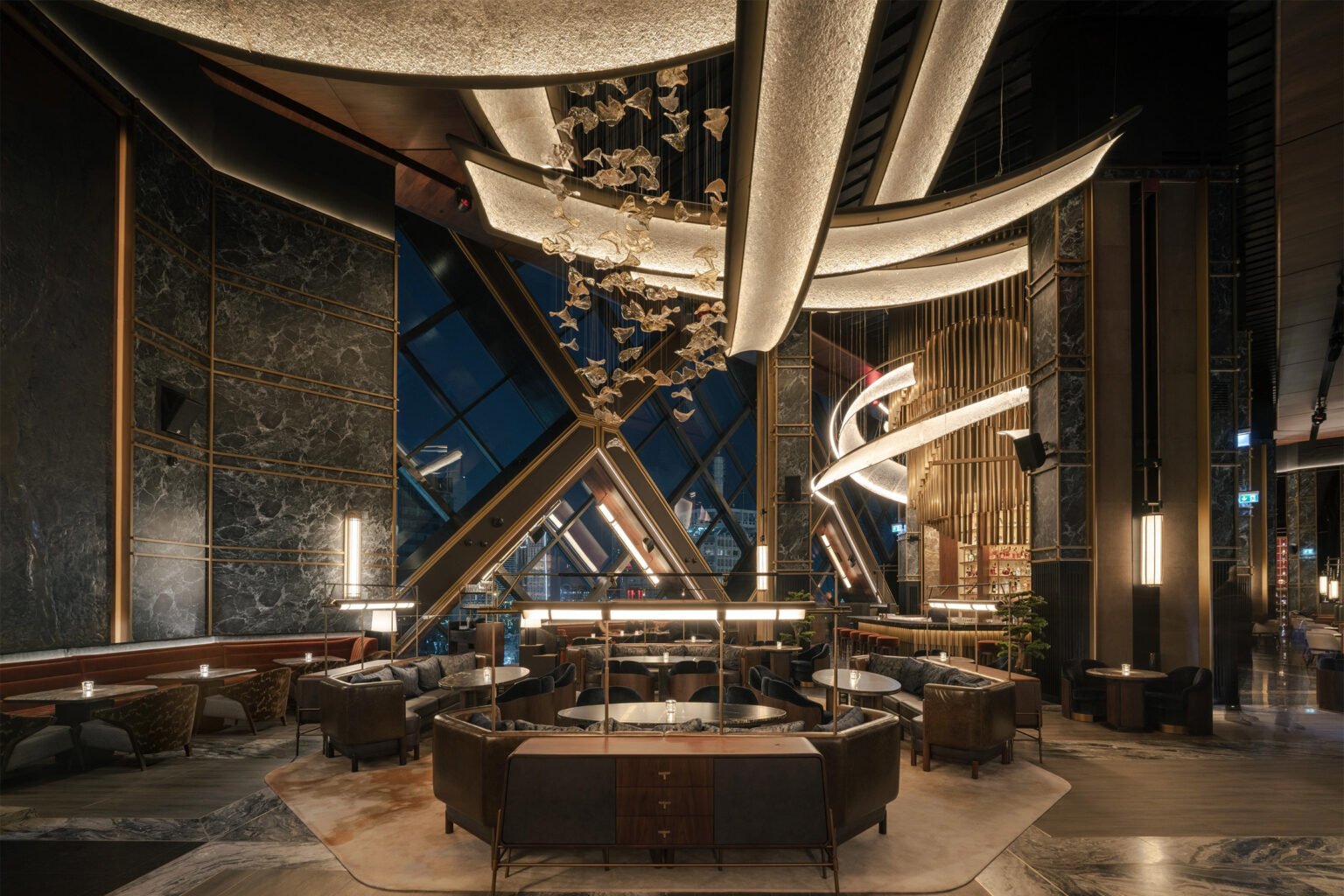 Bespoke sculptural lighting in a refined luxury hospitality interior